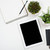 Tablet mock-up and office supplies on white tabletop background stock photo © manera