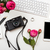 Modern smartphone, computer keyboard, pink flowers and photo cam stock photo © manera
