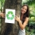 recycling: woman in the forest holding a recycle sign stock photo © mangostock