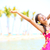 Happy people on beach travel - woman in sarong stock photo © Maridav
