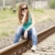 Young girl in glasses sitting at railway. stock photo © Massonforstock