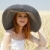 Redhead girl at spring wheat field. stock photo © Massonforstock