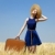 Redhead girl with suitcase at spring wheat field. stock photo © Massonforstock