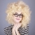 Portrait of funny girl in blonde wig.  stock photo © Massonforstock