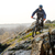 Enduro Cyclist Riding the Mountain Bike Down Beautiful Rocky Trail. Extreme Sport Concept. Space for stock photo © maxpro