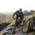 Enduro Cyclist Riding the Mountain Bike Down Beautiful Rocky Trail. Extreme Sport Concept. Space for stock photo © maxpro