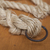 Coil of rope with a marine unit, and an iron ring. stock photo © mcherevan