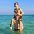 brothers are enjoying the clear warm water in the ocean and play stock photo © meinzahn