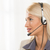 Young Blond Woman With A Headset stock photo © MilanMarkovic78