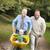 Grandfather with grandson and son pushing wheelbarrow stock photo © monkey_business