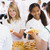 Lunchladies serving plates of lunch in school cafeteria stock photo © monkey_business