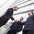 Group of businessmen shaking hands outside office stock photo © monkey_business