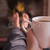 Feet warming at fireplace with hands holding coffee stock photo © monkey_business