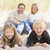 Family relaxing on beach smiling stock photo © monkey_business