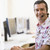 uomo · indossare · auricolare · sala · computer · sorridere · ufficio - foto d'archivio © monkey_business