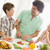 Father And Children Prepare A meal,mealtime Together  stock photo © monkey_business