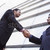 dwa · biznesmenów · drżenie · rąk · na · zewnątrz · biurowiec · nowoczesne - zdjęcia stock © monkey_business