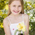 Young girl outdoors holding flower smiling stock photo © monkey_business