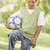 Boy holding football in park stock photo © monkey_business