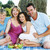 Family sitting outdoors with picnic smiling stock photo © monkey_business