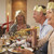 Freunde · tragen · Party · Hüte · Dinnerparty · Essen - stock foto © monkey_business