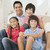 Family sitting on staircase smiling stock photo © monkey_business