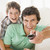 Man and young boy with remote control smiling stock photo © monkey_business