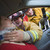 tűzoltók · segít · sebesült · nő · autó · sisak - stock fotó © monkey_business