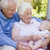 Grandparents outdoors on patio with baby smiling stock photo © monkey_business