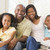 Family sitting in living room smiling stock photo © monkey_business