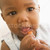 baba · eszik · sárgarépa · lány · gyerekek · gyermek - stock fotó © monkey_business