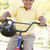 fiatal · srác · bicikli · kint · mosolyog · gyerekek · gyermek - stock fotó © monkey_business