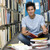 egyetemi · hallgató · dolgozik · könyvtár · férfi · ül · padló - stock fotó © monkey_business