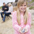 Family at beach with picnic smiling focus on girl with seashells stock photo © monkey_business