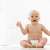 赤ちゃん · 座って · 笑みを浮かべて · 笑顔 · 幸せ - ストックフォト © monkey_business