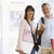 A man and woman with backpacks standing in a campus corridor stock photo © monkey_business