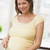 Pregnant woman in kitchen making a salad smiling stock photo © monkey_business