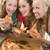 Teenage Girls Eating Pizza  stock photo © monkey_business