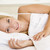Woman lying in bed smiling stock photo © monkey_business