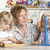 Adult Helping Two Young Children at Montessori/Pre-School stock photo © monkey_business