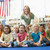 przedszkole · nauczyciel · posiedzenia · dzieci · biblioteki · kobieta - zdjęcia stock © monkey_business