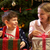 Children Opening Christmas Present In Front Of Tree stock photo © monkey_business