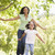 Woman and young girl running outdoors smiling stock photo © monkey_business