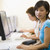 Two women in computer room stock photo © monkey_business