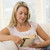 Woman in living room reading book stock photo © monkey_business