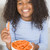 jeune · fille · cuisine · manger · carotte · souriant · fille - photo stock © monkey_business