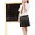 Thoughtful Female Student Wearing Uniform Next To Blackboard stock photo © monkey_business