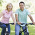 Couple on bikes outdoors smiling stock photo © monkey_business