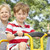 Two Young Boys Playing on Bike stock photo © monkey_business