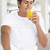 Young Man Drinking Orange Juice stock photo © monkey_business